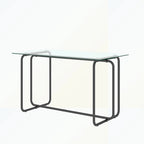 Rechthoekige eettafel met metalen frame en gehard glazen blad